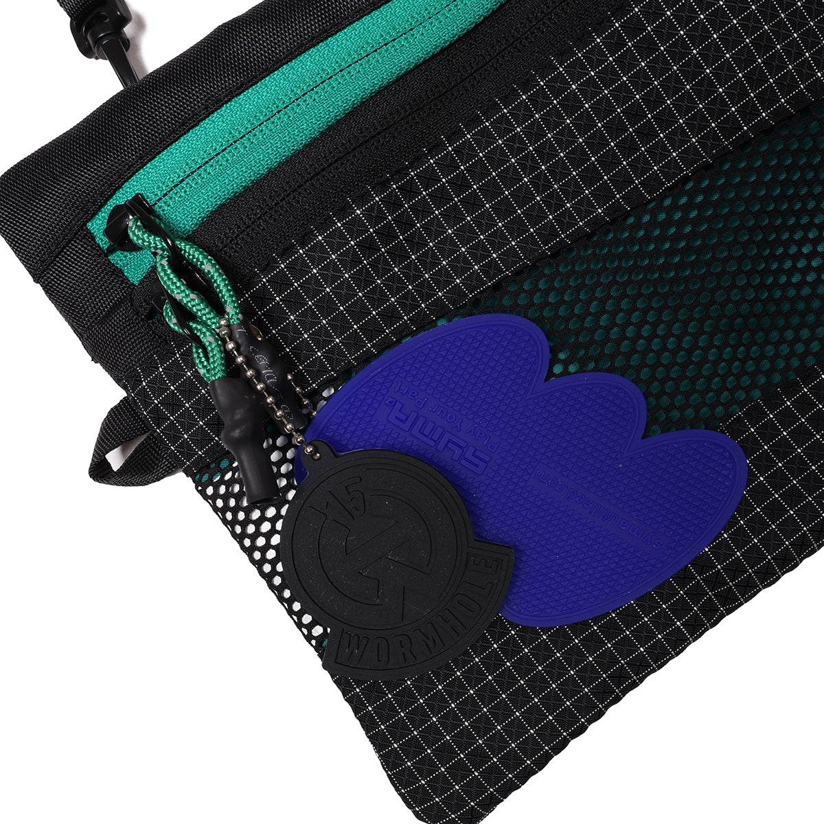 SYMA UTILIZED x WORMHOLE Dark Mantra Sacoche Black/Teal