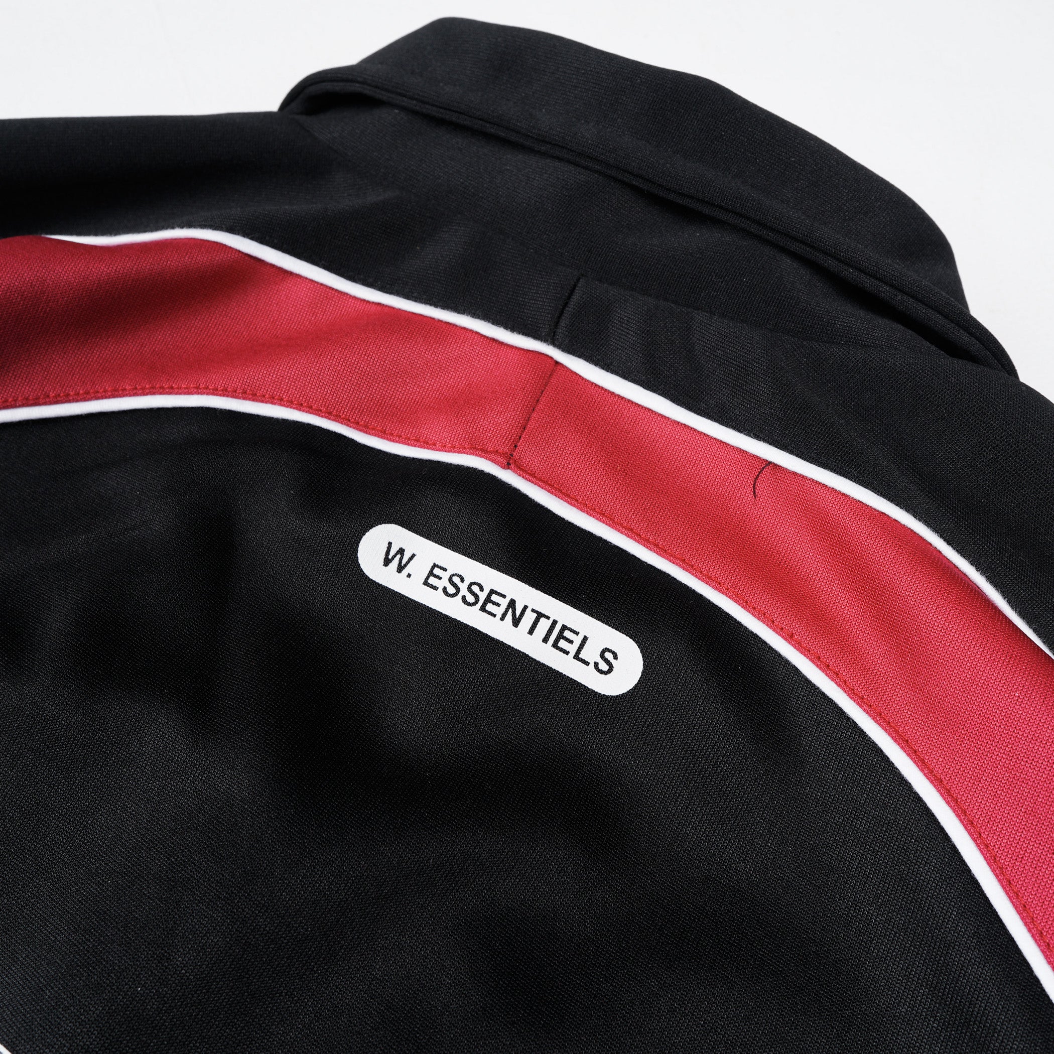 W.Essentiels x Alter Ego Darkpact Tracktop Black/Crimson
